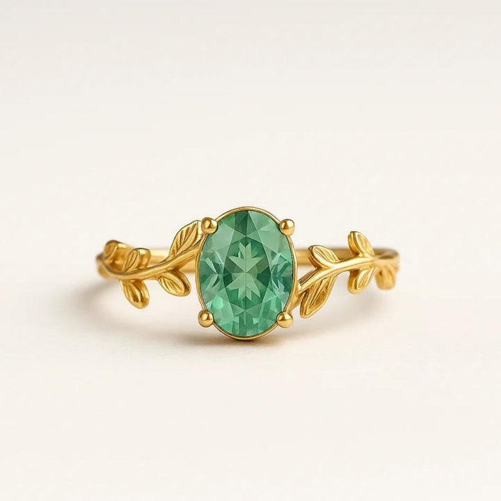 Emerald Wind – Gold ring with green agate and leaf motif